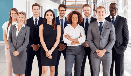 Professional team standing confidently — symbolizing career success and expert resume services by Precision Point Resumes